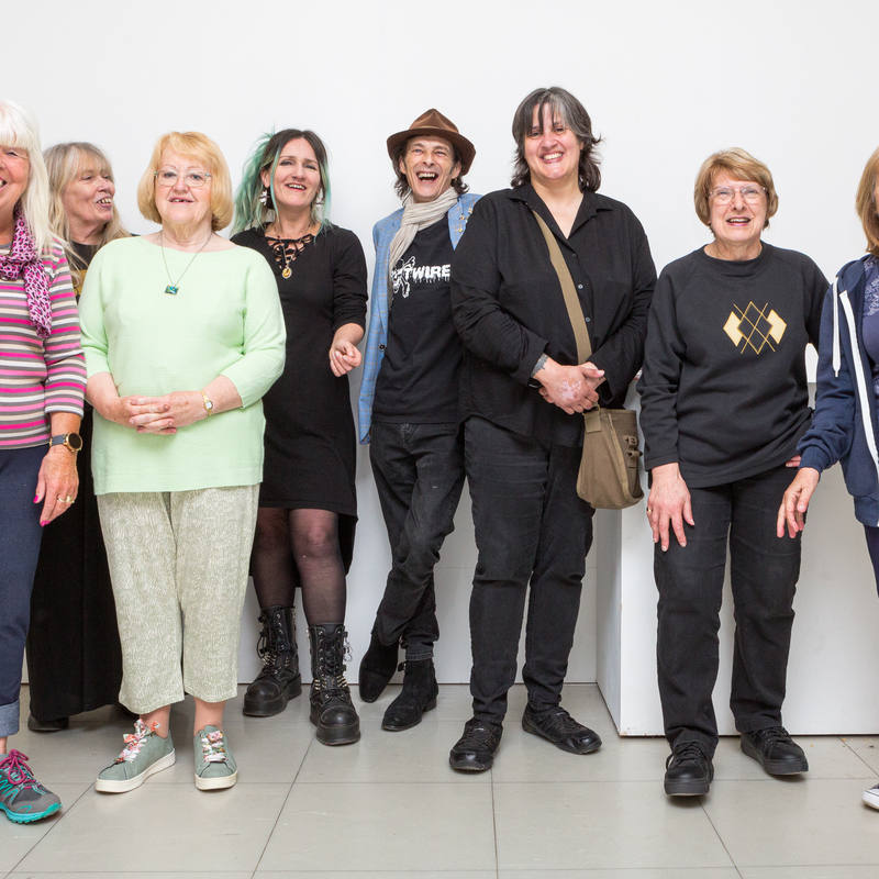 some of the Great Yarmouth Complaints Choir giving their best cheesy grins 